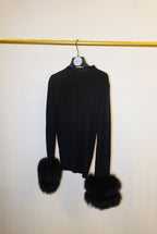 Black top with detachable fur cuffs