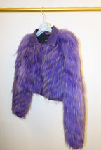 Purple fur jacket on a white background
