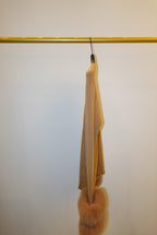 Two tops with detachable fur cuffs