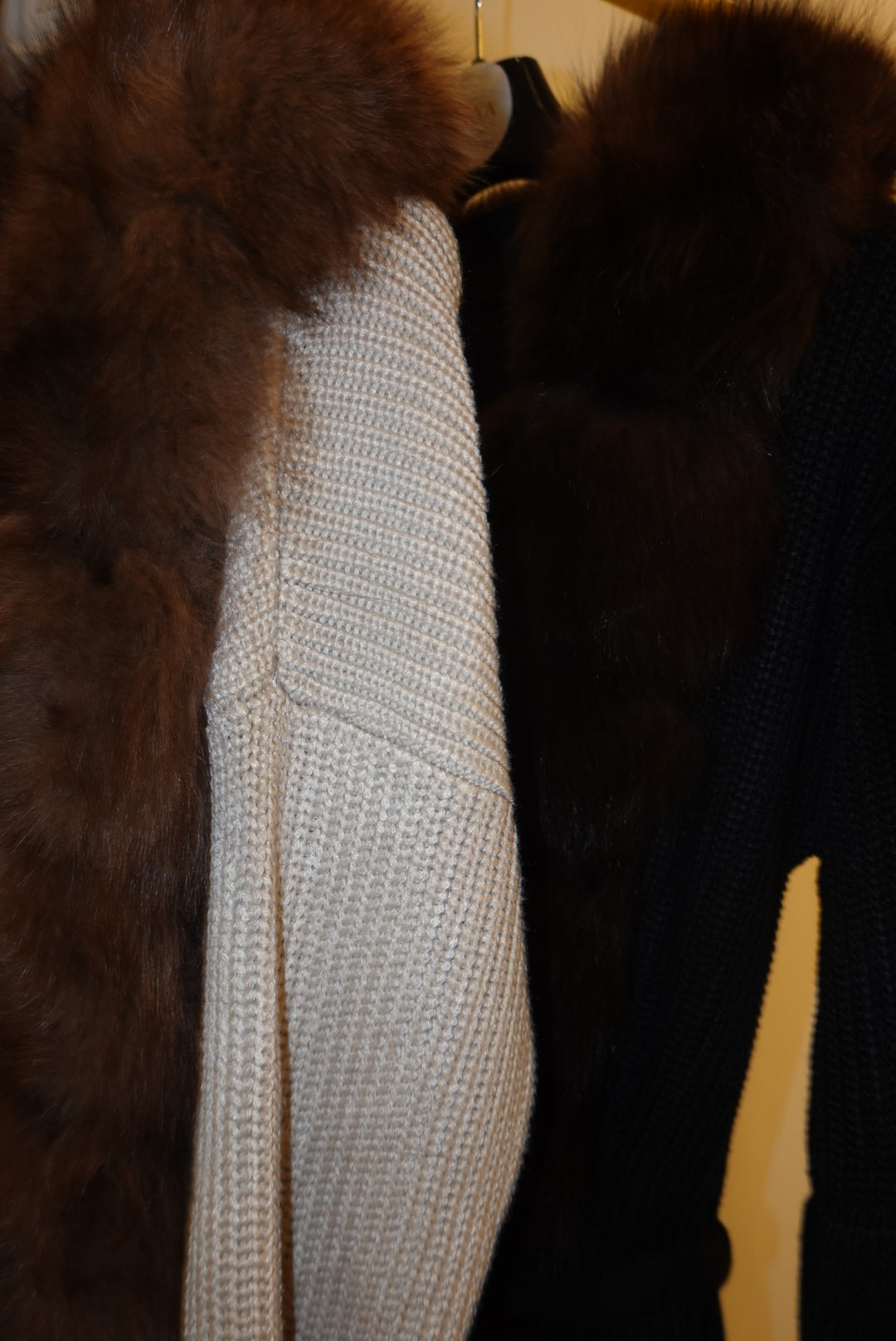 Close-up of a textured fabric surface with a fur border